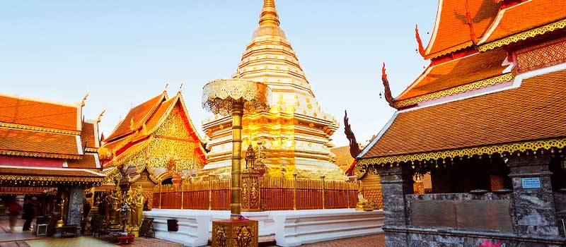 The Lanna old city of Chiang Mai below the forested slopes of Doi Suthep The Lanna old city of Chiang Mai below the forested slopes of Doi Suthep