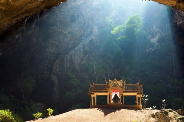 A shrine standing under the cave roof at Khao Luang in central Thailand A shrine standing under the cave roof at Khao Luang in central Thailand
